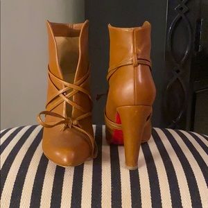 Christian Louboutin saddle brown tie bootie